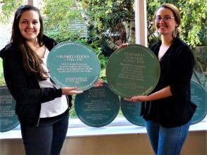Paula Larsson and Olivia Durand unveil the plaques